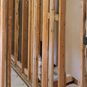 Pictured here is Danbury water damage restoration in a basement.  The basement sheetrock walls sucked up water from the floor and needed to be replaced down to the studs.