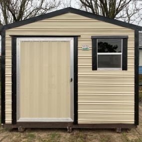 Portable shed with door and window