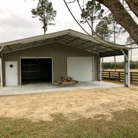 Large covered porch garage structure
