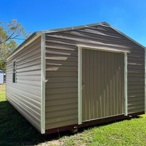 Portable shed with larger door and window