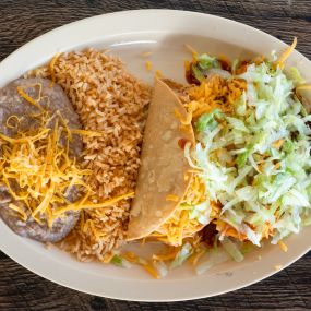 Build your own Mexican combination plate, choose between tacos, burritos, or even enchiladas. all plates come with refried beans and rice.