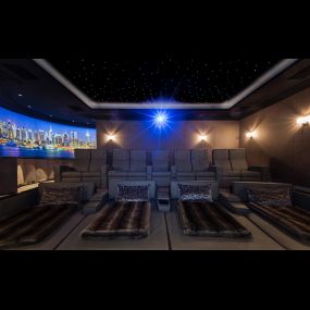 With bespoke cinema daybeds for the front row of seats, and custom detailed stitching on the rear row of seats this beautiful home cinema provided the ultimate in comfort and performance.