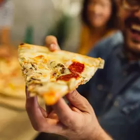 These slices are huge. So big, you might want to request having your slice cut in two. We love a meal that’s made for sharing. That’s amore.