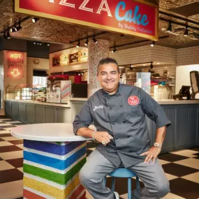 Pizza Cake by Buddy Valastro in New Orleans at Caesars New Orleans Hotel & Casino on 8 Canal Street. Open 7 Days a Week. Buddy’s New York-style pizzeria serves a piece of heaven any way you slice it, with options for freshly made pizza or dessert. The new fast-casual concept is located in the Food Hall at Caesars New Orleans. Experience a New York-style pizzeria, with elements of street art, old-school photos, Buddy's personal playlist, classic furnishings, and more. Grab a seat and dig in at th