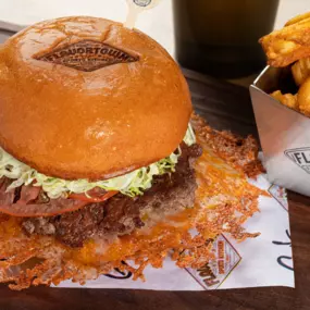 Guy Fieri's Branded Burger at Flavortown Sports Kitchen at the Las Vegas Center Strip Horseshoe Hotel