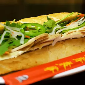 Enjoy a made-to-order Banh Mi at 2Geaux Pho Bar in Harrah's New Orleans. Visit 2Geaux Pho Bar to grab a made-to-order Vietnamese meal. Enjoy Pork Spring Rolls, Beef Pho, Banh Mi or Bun Bo Hue all with quick and easy pick up so you can snack and get back to the excitement at Caesars New Orleans. Have a craving for comfort food? 2Geaux Pho Bar offers convenient Vietnamese classics until 1 AM Friday through Sunday. Step up to the counter and be greeted by Mrs. Phi for friendly service with a smile.