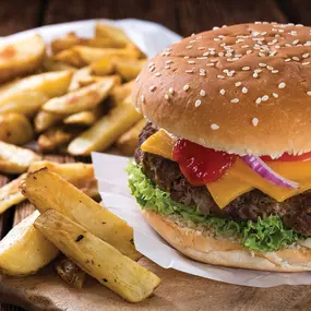 Stacked Burgers at American River Café in Harrah’s Lake Tahoe.  Open daily on the lower level of Harrah's Lake Tahoe, American River Café is a casual restaurant for breakfast, lunch, and dinner. Enjoy comfort food classics, including griddle favorites, piled-high sandwiches, soups and salads, and stacked burgers. The dining room features a man-made natural setting complete with a flowing river, rocky shore, and lush greenery. Feel one with nature of Lake Tahoe with every bite.