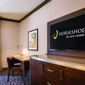 Horseshoe Black Hawk Room Image TV and Desk