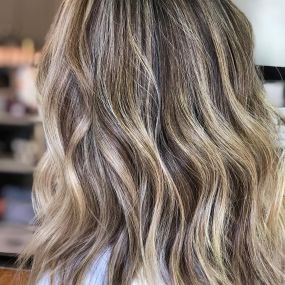 Our stylists receive regular in salon education and also sign up for classes to become experts in specialty coloring.  Book a consultation today to discuss your hair color goals.