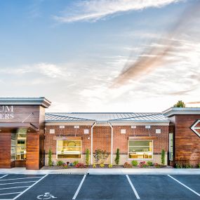 This expansive project resulted in a larger showroom, additional office space, a vault, a client consultation room, and guest restroom. Inside, you will find the latest trends in jewelry store design and technology. Together with the interior remodel, the entry was revamped, including new back-lit LED metal signage. Guests enter the store beneath a unique new cladding material—a rainscreen wood system called Machiche (Machee-chay) which is a long-lasting Brazilian hardwood.

Since re-opening, Mi