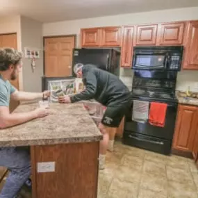 Fully equipped kitchen with a countertop in the center