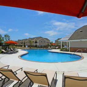 Loungers in front of sparkling pool