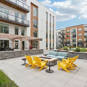 Expansive Courtyard with Two Fire Pits and Grilling Stations