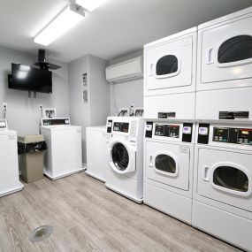 Laundry Center with Machines Next to Folding Counter