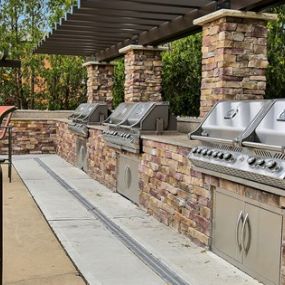 Outdoor Fire Pit & Entertaining Areas With Six Grilling Stations
