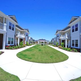 Wide paved path at Fenwyck Manor Apartments