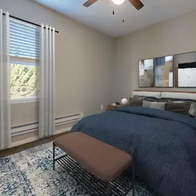 Bedroom with a large bed and a ceiling fan