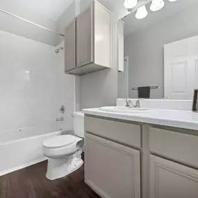 Spacious bathroom with bathtub