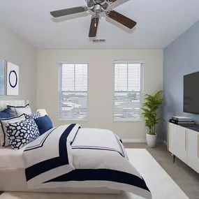 Bedroom with bed and a ceiling fan