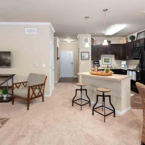 Spacious living and kitchen area at Legends at Chatham Apartment Homes