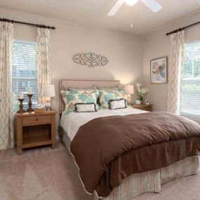 Master bedroom in an apartment at Legends at Chatham Apartment Homes