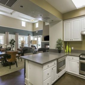 Kitchen and living area at Ventana Senior Apartments