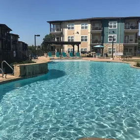 Invigorating swimming pool with sunning deck