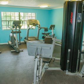 fitness center with cardio machines