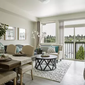 Living room with waterfront view at Harbor Heights