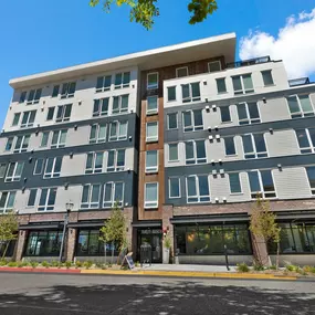 an image of the front of a building  with a blue sky in the background