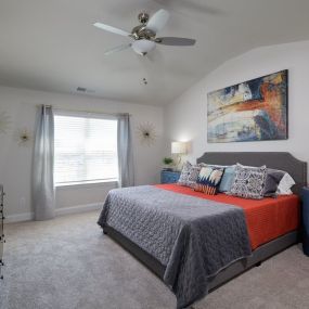 Master bedroom with large window