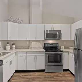Wooden floor kitchen with cabinets