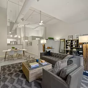 a living room with a couch and a table