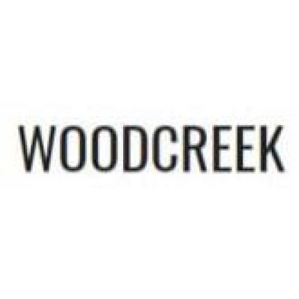 Logotipo de Woodcreek Apartments