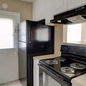 kitchen with refrigerator and stove