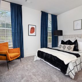 bedroom with blue curtains