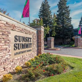 Property logo at Sunset Summit Apartments