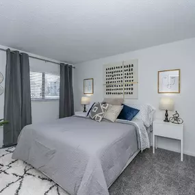 Bedroom interior decor with new gray carpet