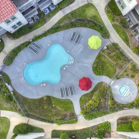 a swimming pool in the middle of a yard