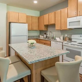 Sample Kitchen With Eat-In Island at The Meridian Apartments