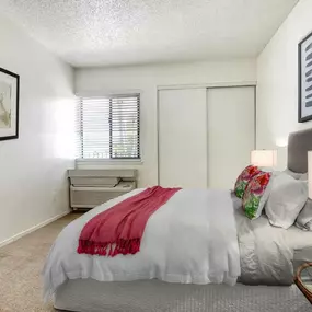 a bedroom with a bed