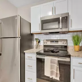 Fully Equipped Kitchens w/ Stainless Steel Appliances