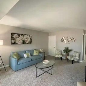 Spacious living room with private, covered patios, or balconies.