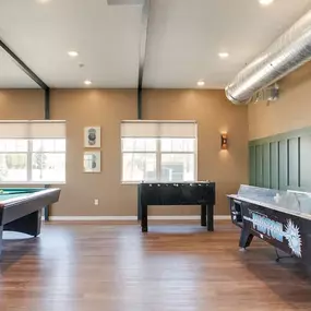 a game room with two pool tables and two air hockey tables, Pinehurst Apartments, Baxter, 56425