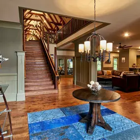 Main office entrance with large staircase to lounge.