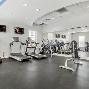 24 Hour Fitness Center with Cardio Machines and Free Weights.