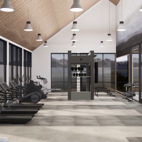 Large fitness center with free weights and cardio machines.