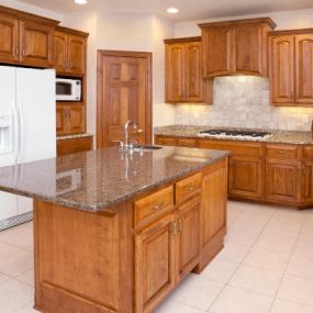 Enhance the beauty and functionality of your kitchen with custom cabinets.