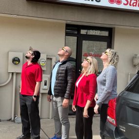State Farm Agent Joe Vitale and team watching the solar eclipse!