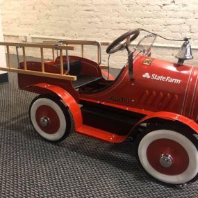We love this old fashion State Farm Fire Engine